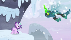 Size: 1280x720 | Tagged: safe, screencap, character:queen chrysalis, character:starlight glimmer, species:changeling, species:pony, species:unicorn, episode:the ending of the end, g4, my little pony: friendship is magic, angry, badass, charge, duo, duo female, fangs, female, fight, flying, forked tongue, glowing horn, gritted teeth, hissing, horn, magic, mountain, open mouth, outdoors, snow, snowfall, tongue out, ultimate chrysalis, wind, windswept mane, wings