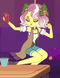 Size: 716x919 | Tagged: safe, screencap, character:vignette valencia, episode:inclement leather, g4, my little pony:equestria girls, beauty mark, cellphone, clothing, cropped, cup, eyes closed, female, flower, flower in hair, holly, inclement leather: vignette valencia, legs, peace sign, phone, pillow, pose, shorts, smartphone, solo, table, vignette valencia