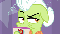 Size: 1920x1080 | Tagged: safe, screencap, character:granny smith, species:earth pony, species:pony, episode:a trivial pursuit, g4, my little pony: friendship is magic, asking, card, elderly, female, floppy ears, granny smith's scarf, hair bun, hoof hold, host, mare, narrowed eyes, obscured face, question, raised eyebrow, raised hoof, solo, trivia trot, wrinkles