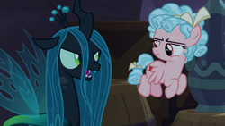 Size: 1920x1080 | Tagged: safe, screencap, character:cozy glow, character:queen chrysalis, species:changeling, species:pegasus, species:pony, episode:the summer sun setback, g4, my little pony: friendship is magic, barrel, changeling queen, cozy glow is not amused, duo, female, filly, flying, foal, queen chrysalis is not amused, unamused