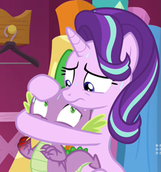 Size: 1001x1066 | Tagged: safe, screencap, character:spike, character:starlight glimmer, species:dragon, species:pony, species:unicorn, episode:a-dressing memories, 9now, holding, holding head, implied injury, nine network, sweat, worried