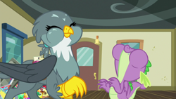 Size: 1920x1080 | Tagged: safe, screencap, character:gabby, character:spike, species:dragon, species:griffon, episode:dragon dropped, g4, my little pony: friendship is magic, comic book, duo, eyes closed, female, gem, male, post office, puffy cheeks, winged spike