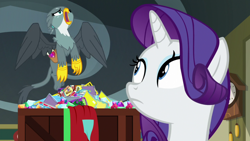 Size: 1920x1080 | Tagged: safe, screencap, character:gabby, character:rarity, species:griffon, species:pony, species:unicorn, episode:dragon dropped, g4, my little pony: friendship is magic, comic book, duo, female, flying, gem, mare, post office