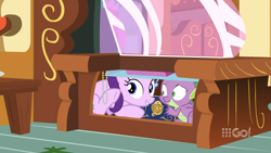 Size: 1280x720 | Tagged: safe, screencap, character:spike, character:starlight glimmer, species:dragon, episode:cakes for the memories, 9go, australia, cupboard, smiling, winged spike