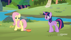 Size: 1600x900 | Tagged: safe, screencap, character:fluttershy, character:twilight sparkle, character:twilight sparkle (alicorn), species:alicorn, species:pony, episode:memnagerie, 9now, bowl, duo, outdoors, river, sad, watermark