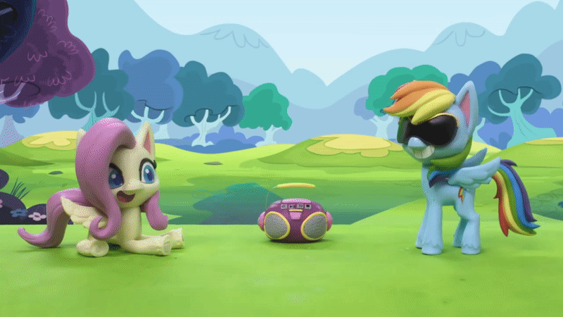 Size: 800x450 | Tagged: safe, screencap, character:fluttershy, character:rainbow dash, species:pegasus, species:pony, g4.5, my little pony: stop motion short, my little pony:pony life, animated, dance dance, dancing, gif, grass, moonwalk, radio, smiling, stop motion, sunglasses, tree, wings