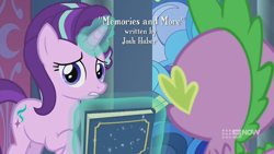 Size: 1280x720 | Tagged: safe, screencap, character:spike, character:starlight glimmer, species:dragon, species:pony, species:unicorn, episode:memories and more, 9now, book, duo, levitation, looking at you, magic, magic aura, scrapbook, telekinesis, winged spike, worried