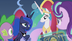 Size: 1280x720 | Tagged: safe, screencap, character:princess celestia, character:princess luna, character:spike, character:starlight glimmer, species:alicorn, species:dragon, species:pony, species:unicorn, episode:memories and more, 9now, book, levitation, looking at each other, magic, magic aura, sad, scrapbook, telekinesis, winged spike