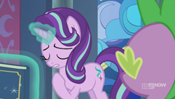 Size: 1280x720 | Tagged: safe, screencap, character:spike, character:starlight glimmer, species:dragon, species:pony, species:unicorn, episode:memories and more, 9now, book, eyes closed, levitation, magic, magic aura, pointing at self, scrapbook, telekinesis, winged spike