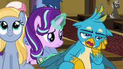 Size: 1920x1080 | Tagged: safe, screencap, character:blues, character:dark moon, character:fuchsia frost, character:gallus, character:goldy wings, character:graphite, character:noteworthy, character:starlight glimmer, species:earth pony, species:griffon, species:pony, species:unicorn, episode:a horse shoe-in, g4, my little pony: friendship is magic, bored, claws, confused, female, friendship student, frown, glowing horn, hair flip, levitation, looking at someone, magic, magic aura, male, mare, narrowed eyes, open mouth, pencil, raised eyebrow, sitting, smiling, squishy cheeks, talking, talons, teenager, telekinesis, unamused, unimpressed, young mare