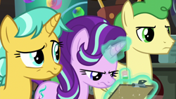 Size: 1920x1080 | Tagged: safe, screencap, character:citrine spark, character:fire quacker, character:huckleberry, character:starlight glimmer, species:pegasus, species:pony, species:unicorn, episode:a horse shoe-in, g4, my little pony: friendship is magic, clipboard, displeased, female, friendship student, glowing horn, hair flip, laboratory, levitation, magic, magic aura, male, mare, narrowed eyes, raised eyebrow, stallion, starlight is not amused, telekinesis, trio, unamused, writing, young mare