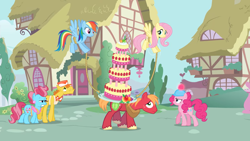 Size: 2000x1125 | Tagged: safe, screencap, character:big mcintosh, character:carrot cake, character:cup cake, character:fluttershy, character:pinkie pie, character:rainbow dash, species:earth pony, species:pegasus, species:pony, episode:mmmystery on the friendship express, g4, my little pony: friendship is magic, balancing, cake, female, flying, food, hard hat, hat, male, mare, marzipan mascarpone meringue madness, ponyville, rope, stallion