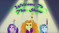 Size: 1920x1080 | Tagged: safe, screencap, character:adagio dazzle, character:aria blaze, character:sonata dusk, equestria girls:rainbow rocks, g4, my little pony:equestria girls, female, lights, raised arm, the dazzlings, title card, trio, trio female, welcome to the show, youtube link