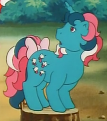 Size: 353x400 | Tagged: safe, screencap, character:fizzy, species:pony, species:unicorn, episode:sweet stuff and the treasure hunt, g1, my little pony 'n friends, bow, cropped, female, looking over shoulder, mare, solo, tail bow, tree stump