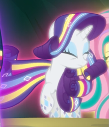 Size: 469x547 | Tagged: safe, screencap, character:rarity, episode:twilight's kingdom, g4, my little pony: friendship is magic, cropped, eyes closed, glow, rainbow power, rainbow power-ified, raised hoof, solo