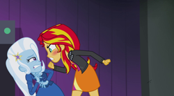Size: 1920x1071 | Tagged: safe, screencap, character:sunset shimmer, character:trixie, equestria girls:rainbow rocks, g4, my little pony:equestria girls, angry, blushing