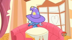 Size: 1667x931 | Tagged: safe, screencap, character:trixie, episode:friendship gems, g4.5, my little pony:pony life, spoiler:pony life s01e17, cape, clothing, hat, solo, trixie's cape, trixie's hat