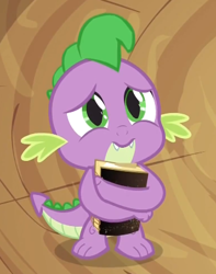 Size: 342x434 | Tagged: safe, screencap, character:spike, species:dragon, episode:magical mystery cure, g4, my little pony: friendship is magic, baby, baby dragon, book, cute, fangs, green eyes, holding, male, sad, scales, solo, spikabetes, twilight's castle