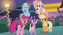 Size: 856x473 | Tagged: safe, screencap, character:applejack, character:fluttershy, character:pinkie pie, character:rainbow dash, character:twilight sparkle, episode:sweet and elite, g4, my little pony: friendship is magic, birthday dress, bomb, clothing, dress, hub logo, weapon, youtube caption