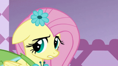 Size: 450x253 | Tagged: safe, screencap, character:fluttershy, episode:suited for success, g4, my little pony: friendship is magic, animated, clothing, dress, floppy ears, flower, flower in hair, gala dress, solo