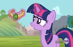 Size: 1403x901 | Tagged: safe, screencap, character:twilight sparkle, character:twilight sparkle (unicorn), species:pony, species:unicorn, episode:magic duel, g4, my little pony: friendship is magic, glowing horn, horn, hub logo, magic, magic glow, solo