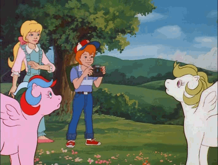 Size: 710x540 | Tagged: safe, screencap, character:danny williams, character:megan williams, character:surprise, character:whizzer, species:human, episode:the great rainbow caper, g1, my little pony 'n friends, animated, camera, camera flashes, photo, smiling