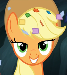 Size: 562x629 | Tagged: safe, screencap, character:applejack, episode:trade ya, g4, my little pony: friendship is magic, confetti, grin, happy, lidded eyes, looking at you, smiling, smirk, solo
