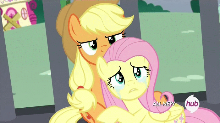 Size: 700x393 | Tagged: safe, screencap, character:applejack, character:fluttershy, species:earth pony, species:pegasus, species:pony, episode:twilight's kingdom, g4, my little pony: friendship is magic, angry, animated, applejack is not amused, applejack's hat, betrayed, cage, comforting, cowboy hat, crying, duo, female, floppy ears, folded wings, glare, heartbreak, hub logo, hug, looking at someone, mare, ponytail, poor fluttershy, sitting, stetson, unamused