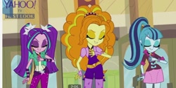 Size: 670x337 | Tagged: safe, screencap, character:adagio dazzle, character:aria blaze, character:sonata dusk, equestria girls:rainbow rocks, g4, my little pony:equestria girls, battle of the bands, cafeteria, female, gem, hand on chest, singing, siren gem, the dazzlings, trio