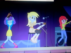 Size: 640x480 | Tagged: safe, screencap, character:derpy hooves, equestria girls:rainbow rocks, g4, my little pony:equestria girls, background human, blueberry pie, cowbell, musical instrument, musical saw, raspberry fluff, saw, triangle