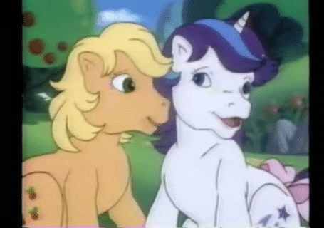 Size: 455x320 | Tagged: safe, screencap, character:applejack (g1), character:glory, species:earth pony, species:pony, species:unicorn, episode:rescue at midnight castle, g1, animated, bow, cute, face licking, female, glorybetes, horses doing horse things, jackabetes, licking, mare, silly, silly pony, tail bow