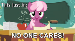 Size: 714x394 | Tagged: safe, screencap, character:cheerilee, episode:family appreciation day, g4, my little pony: friendship is magic, apple, caption, chalkboard, classroom, desk, eraser, image macro, meme, paper, ponyville schoolhouse, reaction image, reading, solo