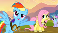 Size: 1366x768 | Tagged: safe, screencap, character:flitter, character:fluttershy, character:rainbow dash, species:pegasus, species:pony, episode:hurricane fluttershy, g4, my little pony: friendship is magic, female, goggles, mare, pointing, youtube, youtube caption, youtube link