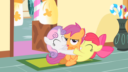 Size: 1280x720 | Tagged: safe, screencap, character:apple bloom, character:scootaloo, character:sweetie belle, species:earth pony, species:pegasus, species:pony, episode:the cutie mark chronicles, g4, my little pony: friendship is magic, annoyed, cutie mark crusaders, eyeroll, eyes closed, frown, gang hape, grin, group hug, hape, hug, non-consensual cuddling, scootaloo is not amused, sitting, smiling, squee
