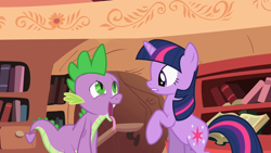 Size: 1280x720 | Tagged: safe, screencap, character:spike, character:twilight sparkle, species:dragon, species:pony, species:unicorn, episode:secret of my excess, g4, my little pony: friendship is magic, book, female, male, mare