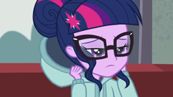 Size: 1280x720 | Tagged: safe, screencap, character:twilight sparkle, character:twilight sparkle (scitwi), species:eqg human, equestria girls:friendship games, g4, my little pony:equestria girls, clothing, glasses, hoodie, sitting, solo