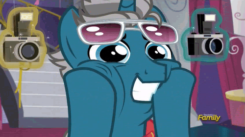 Size: 500x281 | Tagged: safe, screencap, character:fashion plate, episode:canterlot boutique, g4, my little pony: friendship is magic, animated, camera, discovery family, discovery family logo, eye shimmer, faec, fashion reaction, glasses, grin, magic, meme, smiling, solo, squishy cheeks, telekinesis