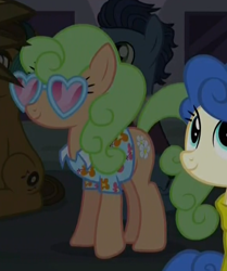 Size: 582x697 | Tagged: safe, screencap, character:waxton, species:earth pony, species:pony, episode:made in manehattan, g4, my little pony: friendship is magic, background pony, blueberry curls, bubblegum blossom, clothing, female, floral pattern, glasses, hawaiian shirt, heart glasses, male, mare, shirt, stallion, unnamed pony