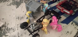Size: 3264x1546 | Tagged: artist needed, source needed, safe, character:applejack, character:derpy hooves, character:pinkie pie, character:rainbow dash, cart, chassis, engine, everfree customs, figurine, garage, i just don't know what went wrong, oops, photo, pontiac gto