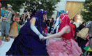 Size: 132x80 | Tagged: artist needed, source needed, safe, artist:starsofcassiopeia, character:pinkie pie, character:twilight sparkle, species:human, animated, clothing, convention, cosplay, dancing, dress, gala dress, irl, irl human, katsucon, photo, youtube, youtube link
