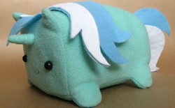 Size: 797x495 | Tagged: artist needed, safe, character:lyra heartstrings, species:pony, species:unicorn, irl, lyra loaf, photo, plushie, ponyloaf, solo, wat