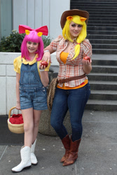 Size: 1280x1920 | Tagged: artist needed, source needed, safe, artist:canadianjaeger, artist:weatherstone, character:apple bloom, character:applejack, species:human, apple, basket, cosplay, fan expo, irl, irl human, obligatory apple, overalls, photo, target demographic, vancouver fan expo, vancouver fan expo 2013
