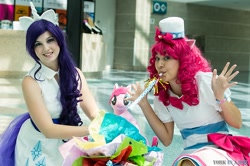 Size: 500x332 | Tagged: artist needed, safe, artist:maxpowercosplay, artist:rmtakesover, artist:unkcos8, character:pinkie pie, character:rarity, species:human, anime expo, clothing, cosplay, dress, gala dress, irl, irl human, party cannon, party horn, photo