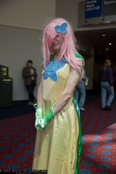 Size: 1365x2048 | Tagged: artist needed, safe, character:fluttershy, species:human, clothing, convention, cosplay, crossdressing, crossplay, dress, gala dress, gloves, irl, irl human, photo, wizard world portland