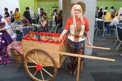 Size: 1080x720 | Tagged: artist needed, safe, character:applejack, species:human, 2014, cart, chaps, convention, cosplay, defictionalization, element of honesty, fanimecon, irl, irl human, photo