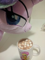 Size: 510x680 | Tagged: safe, artist:bugplayer, character:fluttershy, character:starlight glimmer, species:pony, species:unicorn, chocolate, cup, devious, empathy cocoa, evil planning in progress, female, food, hot chocolate, irl, mare, marshmallow, marshmallows, mug, photo, photographer needed, plushie, pure unfiltered evil, smiling, smug, smuglight glimmer, solo