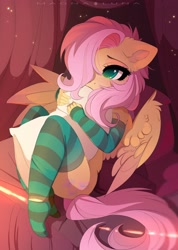 Size: 1920x2693 | Tagged: safe, artist:magnaluna, character:fluttershy, species:anthro, species:pegasus, species:plantigrade anthro, species:pony, adorasexy, beautiful, beautisexy, bed, blushing, casual nudity, clothing, colored pupils, covering, cute, cutie mark, ear fluff, female, fingerless gloves, floppy ears, gloves, hair over one eye, hug, leggings, long gloves, looking at you, mare, nudity, partial nudity, pillow, pillow hug, precious, sexy, shyabetes, socks, solo, spread wings, striped gloves, striped socks, sweet dreams fuel, thigh highs, wing fluff, wings