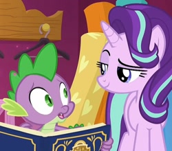 Size: 818x720 | Tagged: safe, edit, edited screencap, screencap, character:spike, character:starlight glimmer, species:dragon, episode:a-dressing memories, spoiler:a-dressing memories, spoiler:mlp friendship is forever, book, cropped, lidded eyes, smiling, smug, winged spike