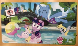 Size: 1600x962 | Tagged: safe, artist:pixelkitties, character:derpy hooves, character:gummy, character:princess celestia, character:princess luna, character:trixie, character:twilight sparkle, character:twilight sparkle (alicorn), species:alicorn, species:pony, ball, beach ball, clothing, enterplay, eyes closed, floaty, frown, hoof hold, inflatable, inner tube, jumping, merchandise, one-piece swimsuit, open mouth, orange frog, playmat, smiling, sunburn, sunglasses, suntan lotion, swimming pool, swimsuit, umbrella drink, unamused, wide eyes