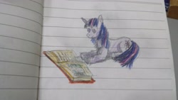 Size: 4128x2322 | Tagged: safe, artist:horsesplease, character:twilight sparkle, atlas, book, geography, happy, lined paper, photo, reading, shading, solo, traditional art